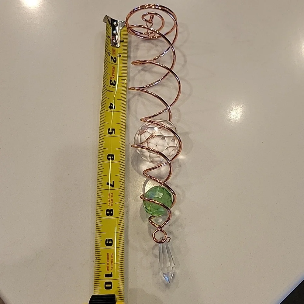 Elegant Copper Spiral Ornament with Crystal Accents